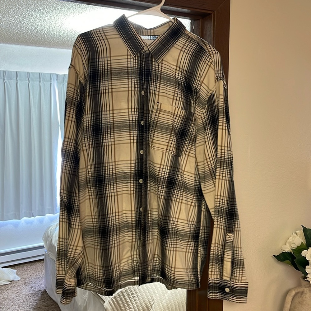 Flannel button-up shirt from Hollister. Barely worn.
